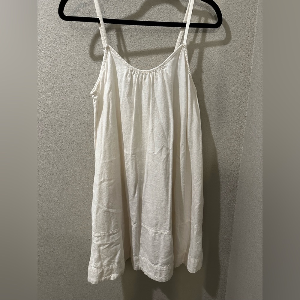White flowy linen dress